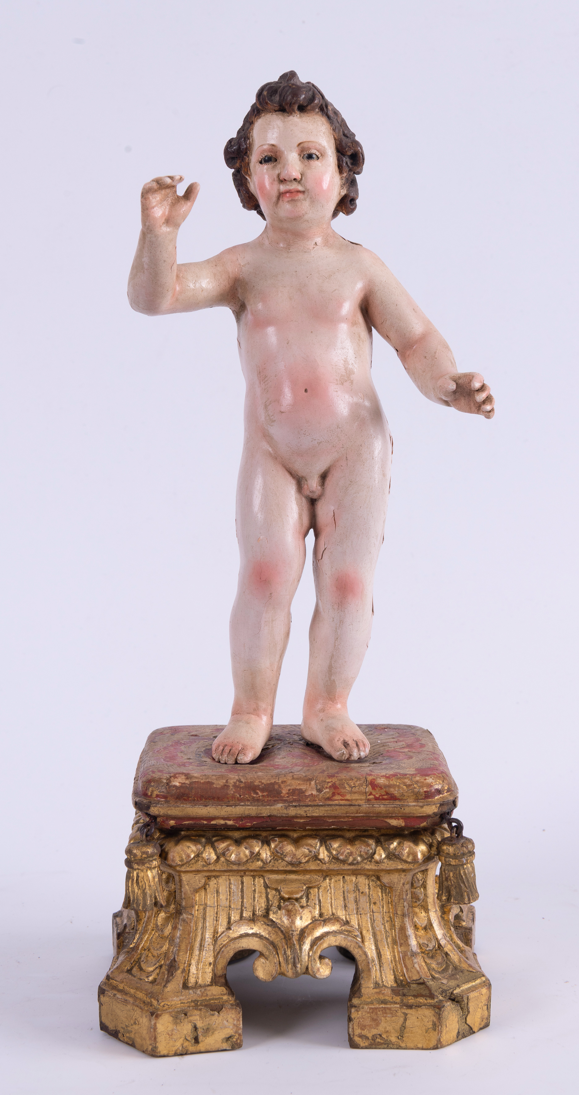 Escuela andaluza S.XVIII. Escultura del Niño Jesús desnudo en madera tallada y policromada. Sobre...