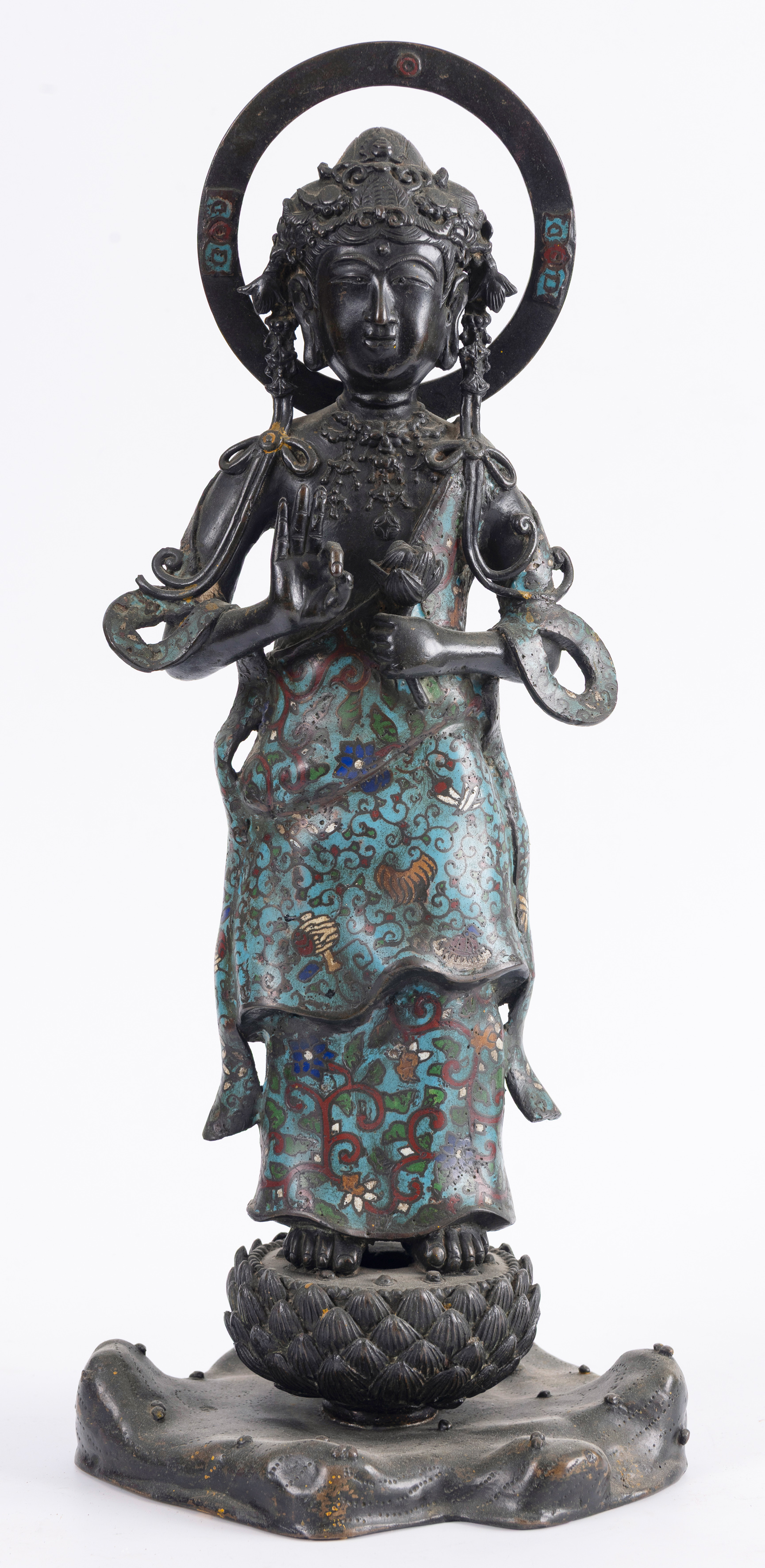 Escultura antigua de diosa hindú 
En bronce pavonado con esmalte cloisonné en la...