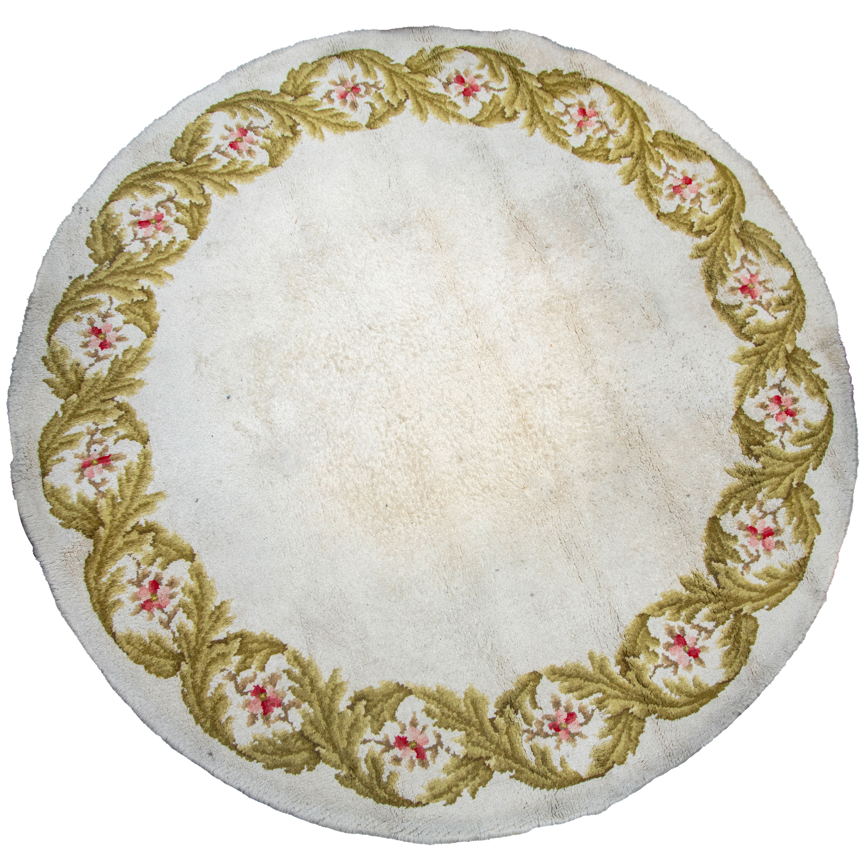 Alfombra redonda en lana, Francia, mm. S. XX
Campo color crema con decoración de friso continuo de...