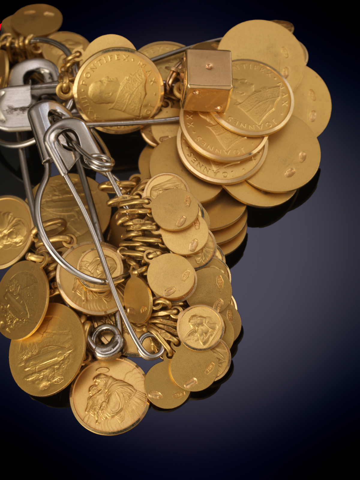 LOTE DE MEDALLAS EN ORO AMARILLO DE 18 K.