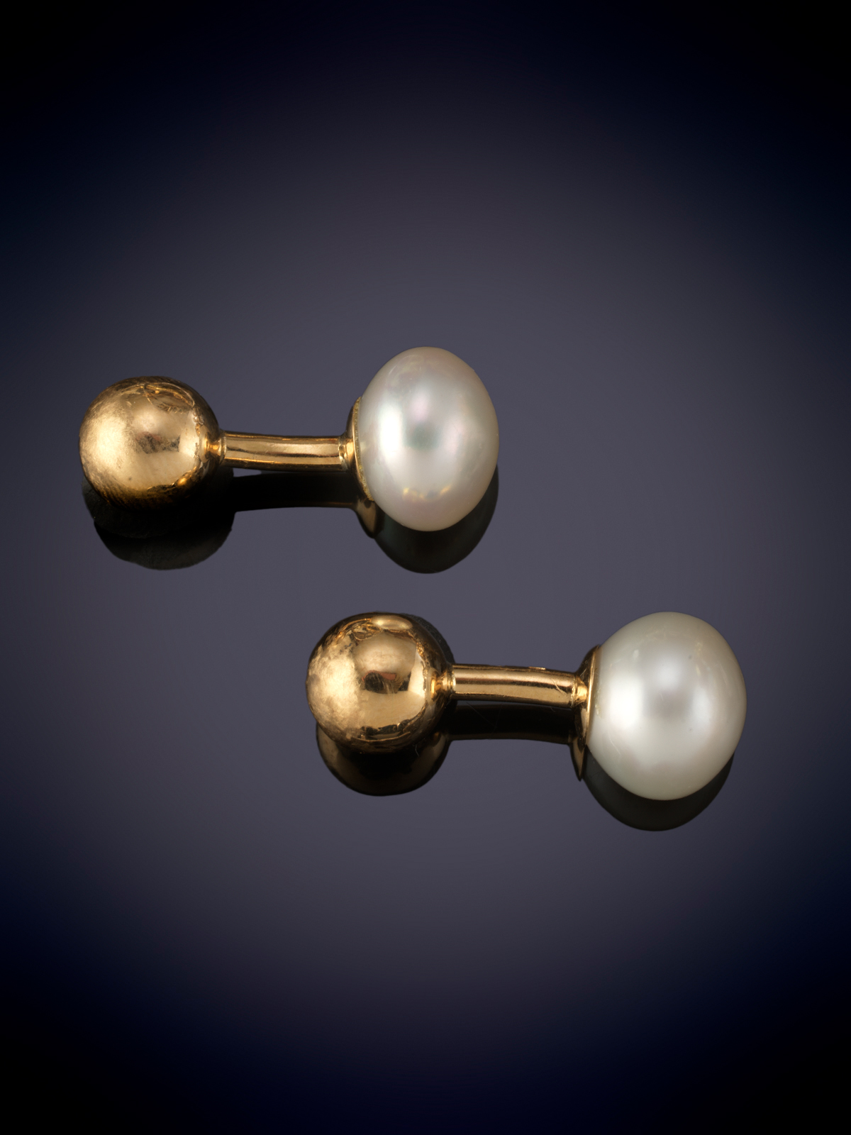 GEMELOS DE PERLA Y ORO AMARILLO DE 18K.