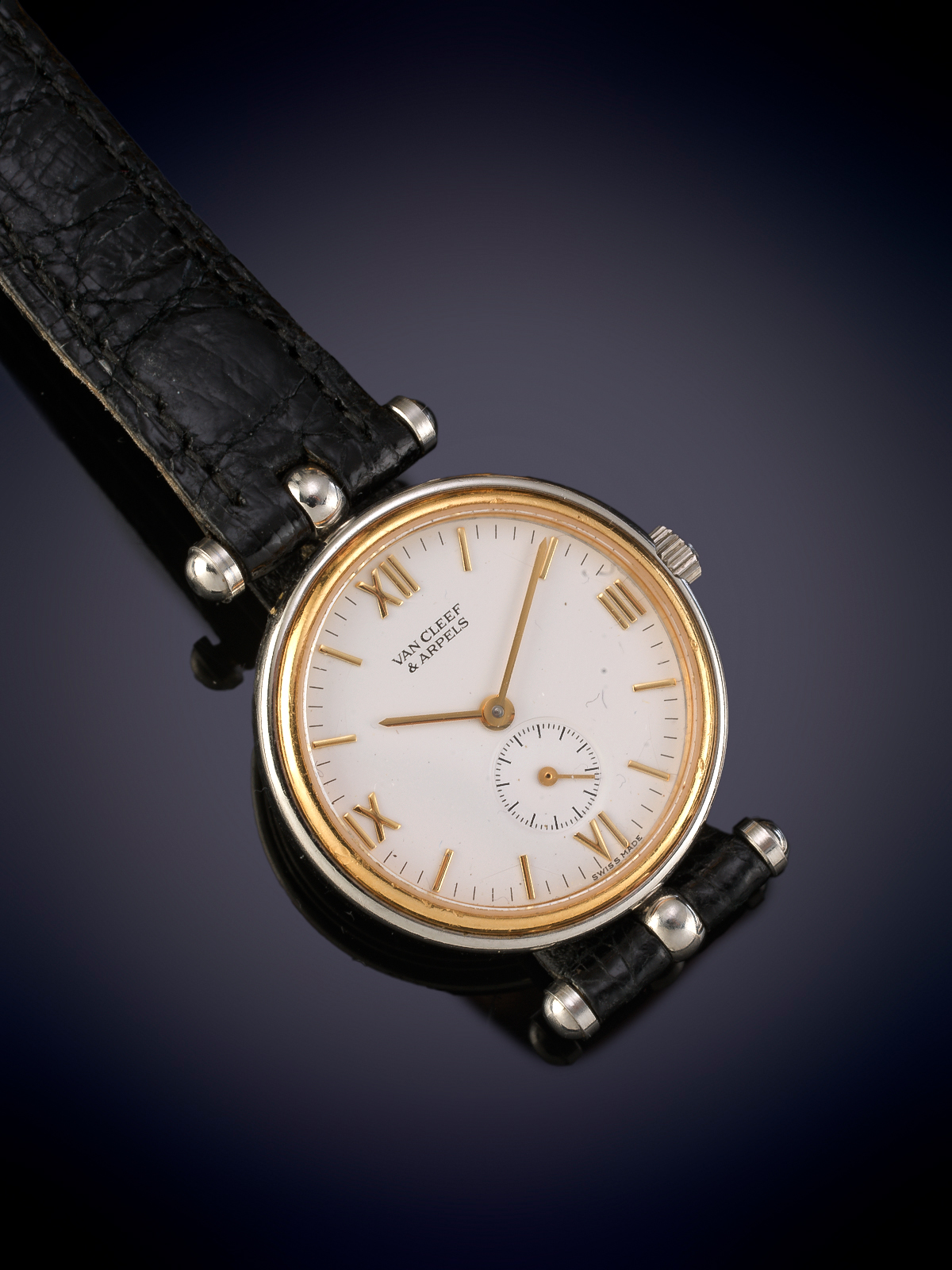 VAN CLEEF & ARPELS. RELOJ DE PULSERA PARA SEÑORA EN ACERO Y PLAQUÉ DE ORO. ESFERA BLANCA CON...