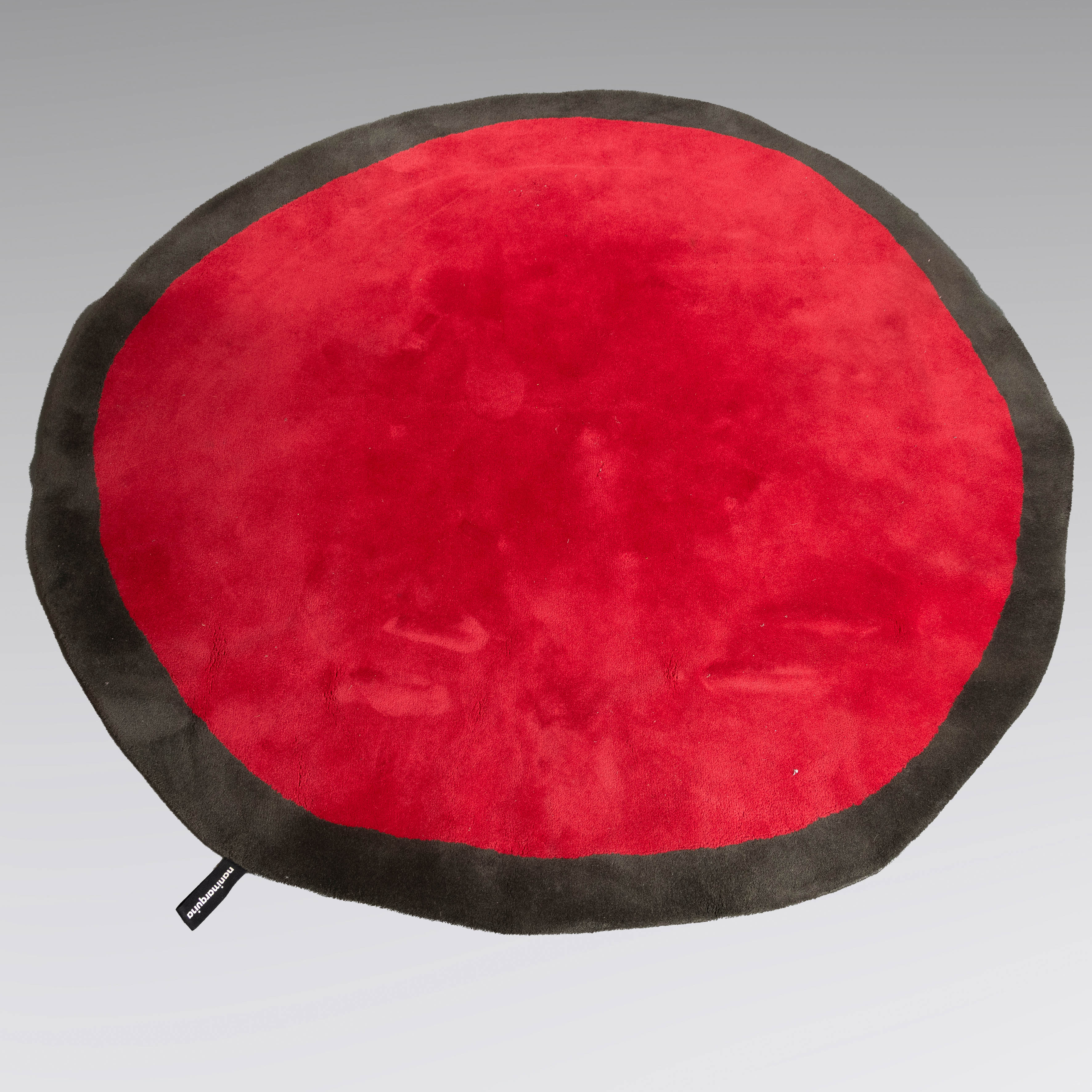 NANNI MARQUINA (Barcelona 1952 )
"Aros Round Rug Red. Mod 20LA NSI"
Alfombra circular de forma...