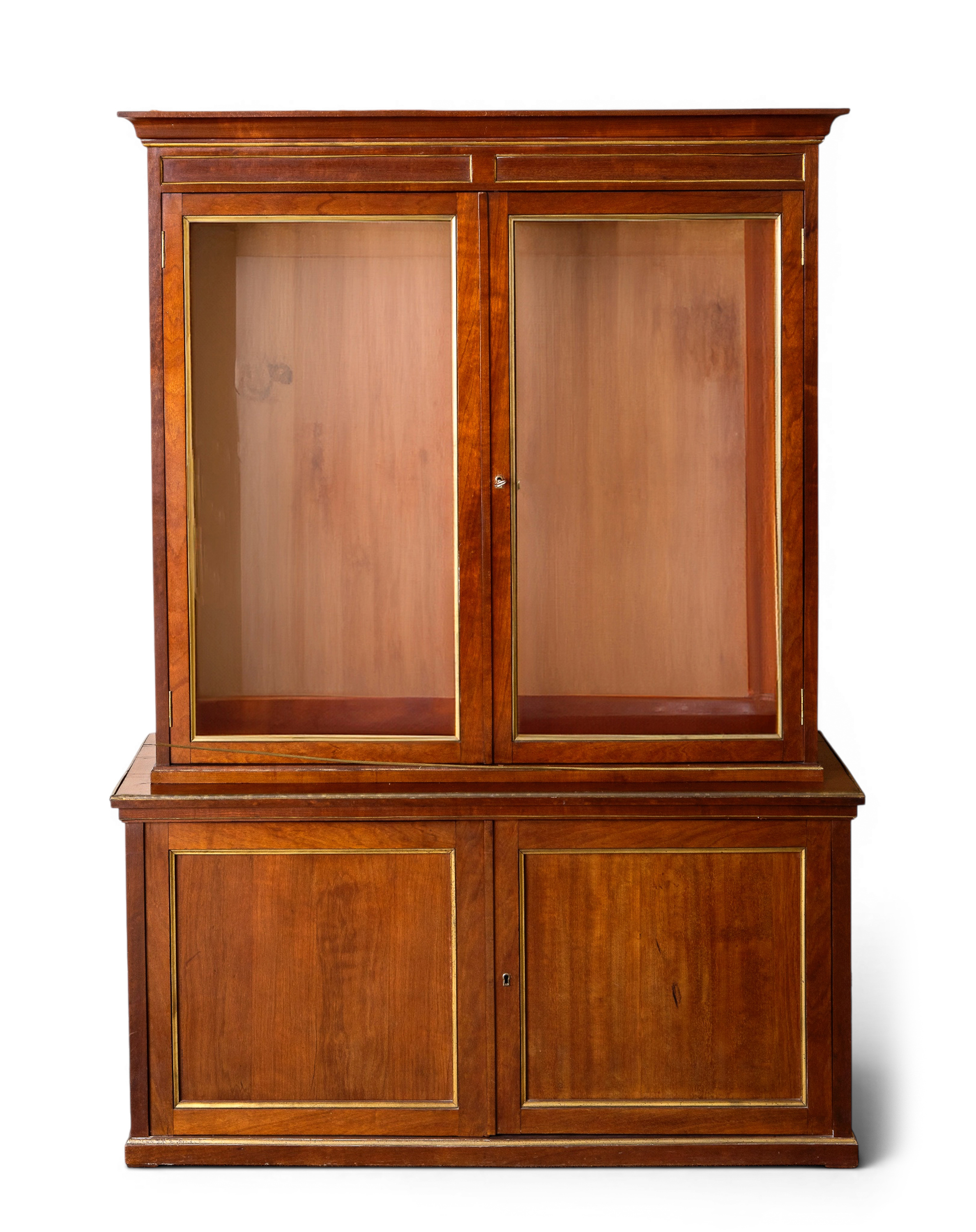 Armario biblioteca inglés en madera de caoba y cristal biselado.