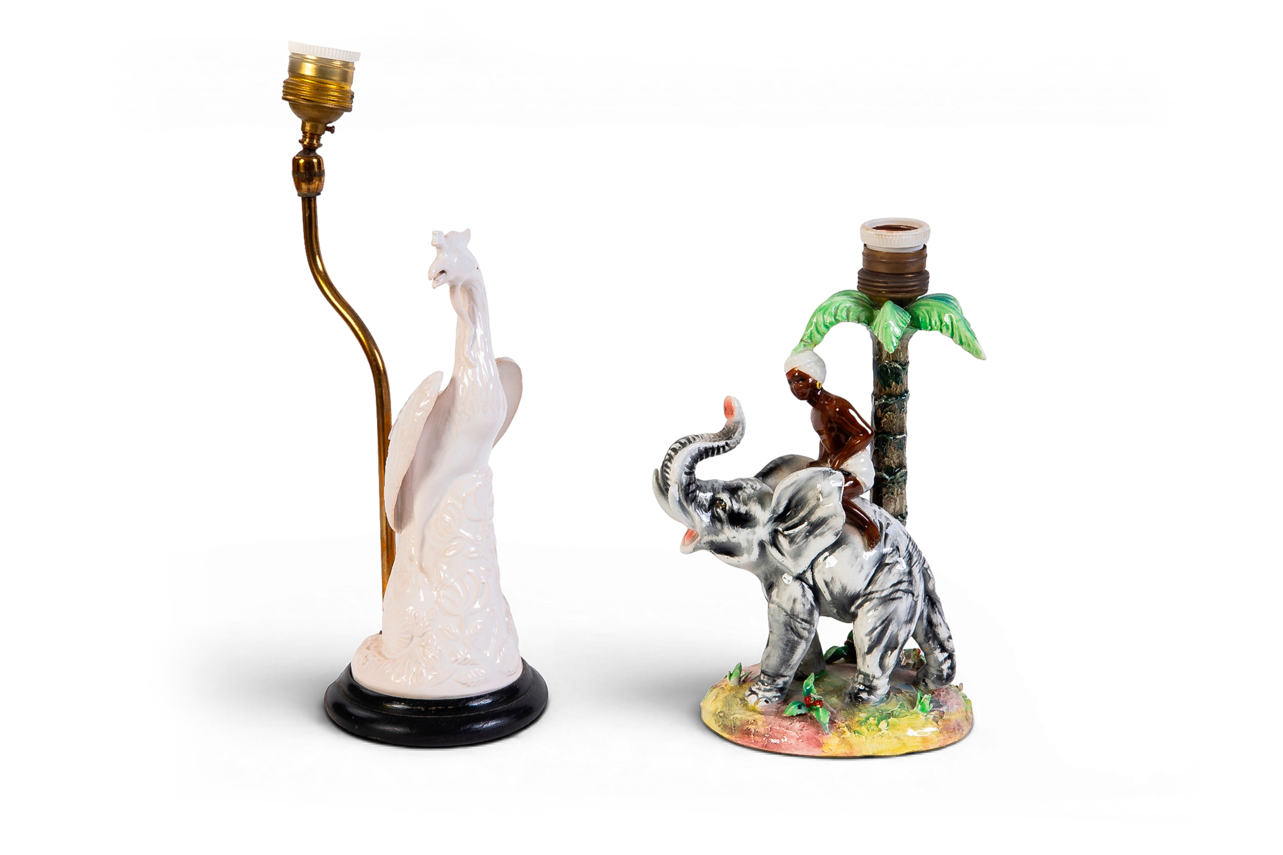 Pareja de lamparitas exóticas en cerámica esmaltada. 
Altura mayor: 28 cm.
